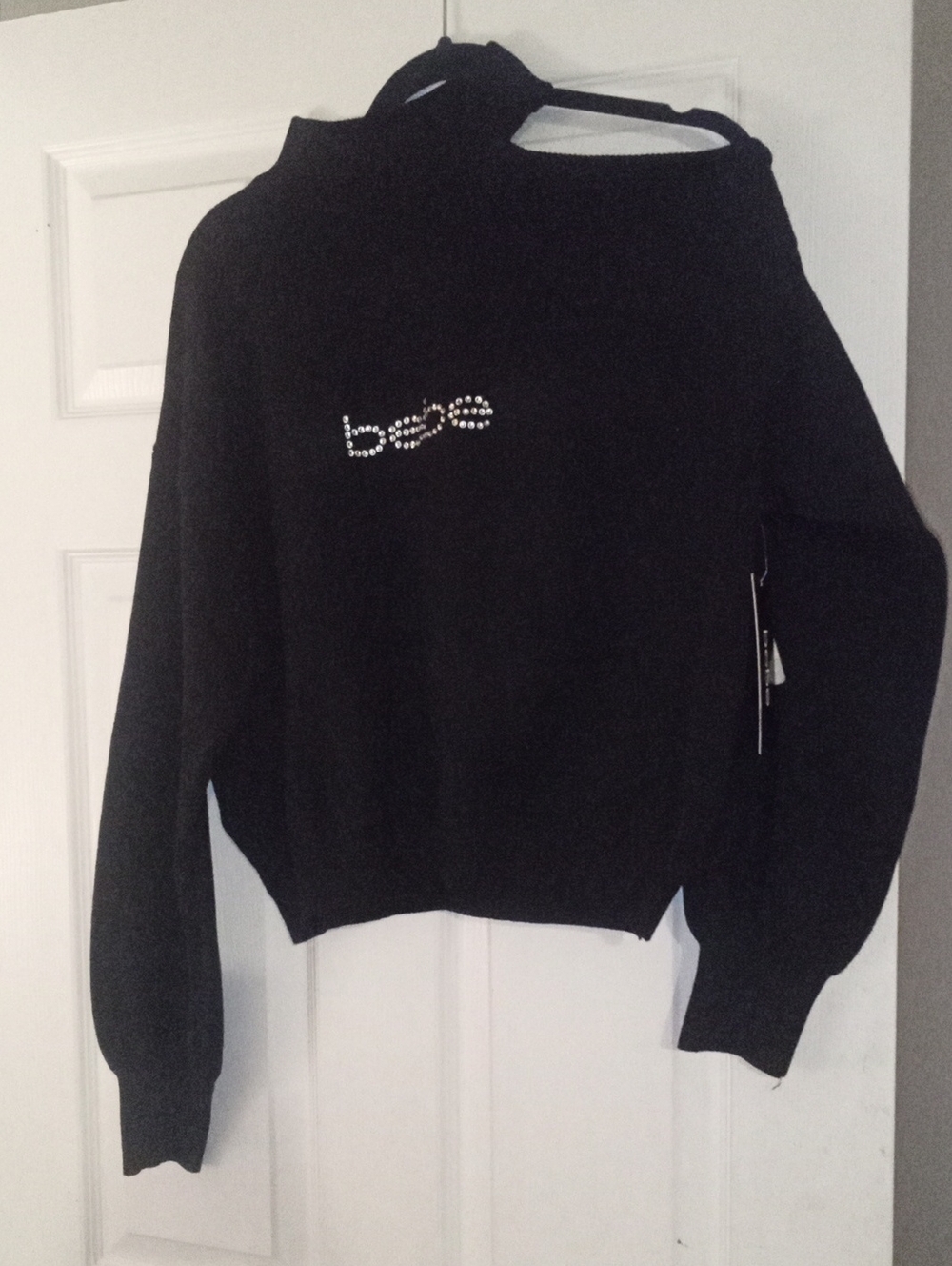 NWT bebe Black Off-Shoulder Cutout Rhinestone Logo Sweater